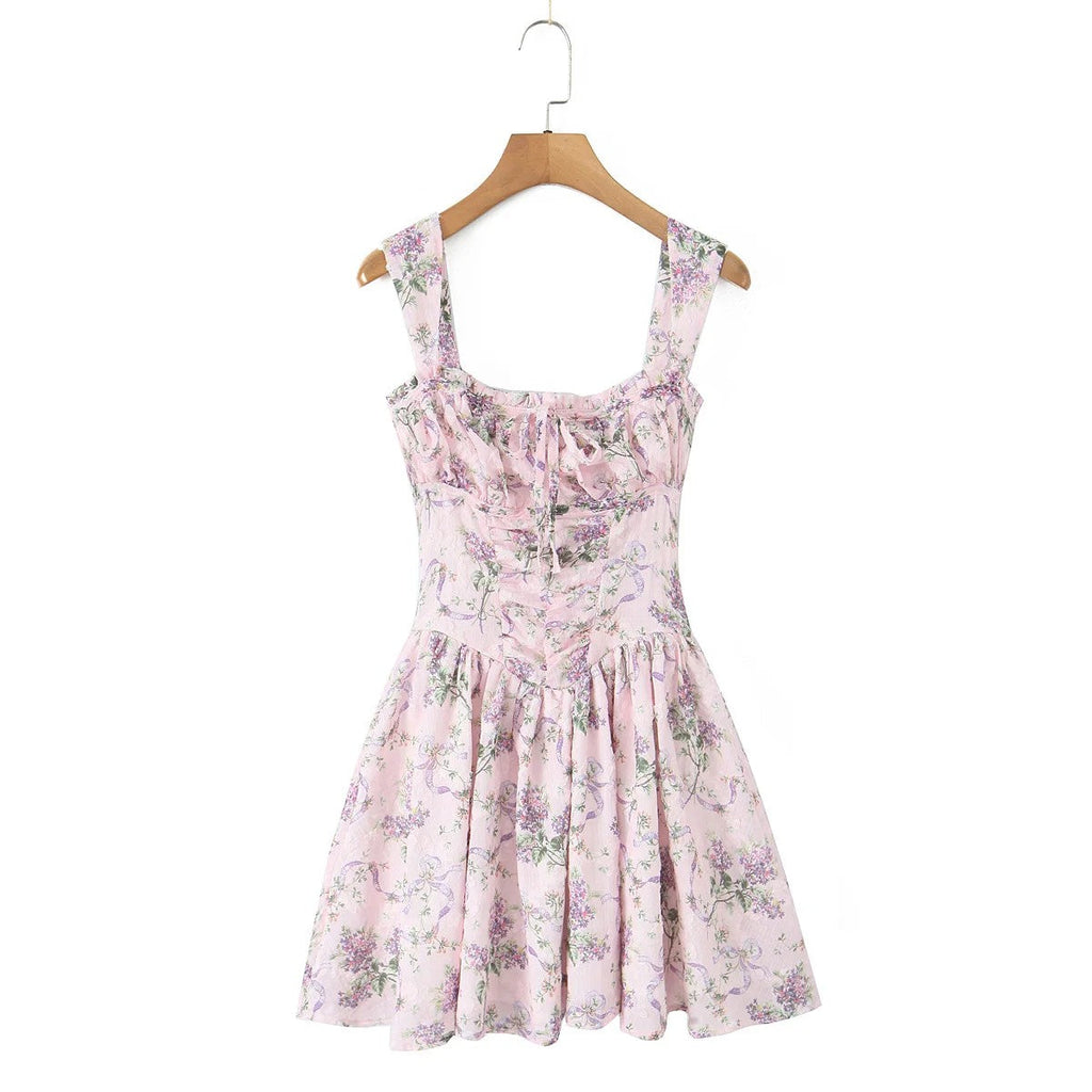 Vestido corto Bellami de flores rosa en percha