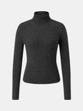 Top de canalé con cuello alto negro